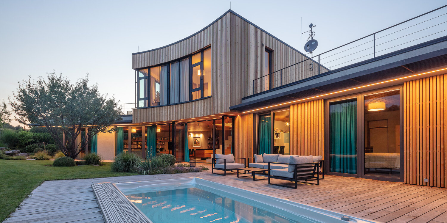 Designer home with USSPA Swim Spa XL – inspiration for placing a premium all-season pool.