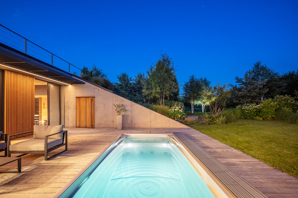 Designer home with USSPA Swim Spa XL – inspiration for placing a premium all-season pool.