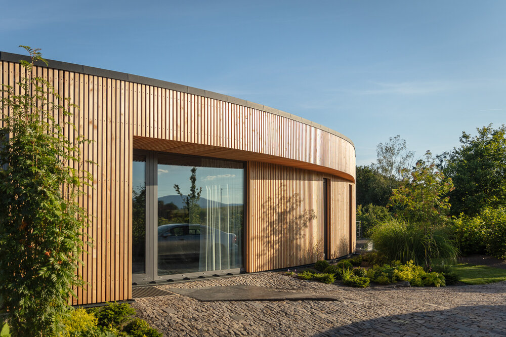 Designer home with USSPA Swim Spa XL – inspiration for placing a premium all-season pool.