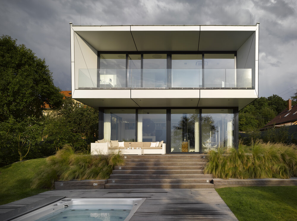Designer home with USSPA Swim Spa XL – inspiration for placing a premium all-season pool.
