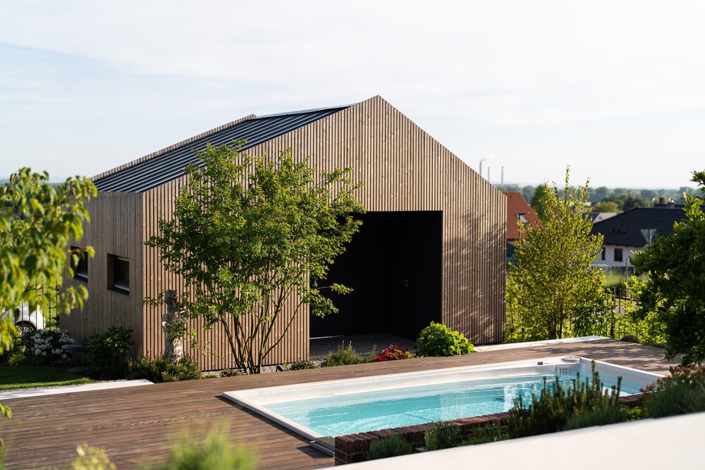 Designer home with USSPA Swim Spa XL – inspiration for placing a premium all-season pool. Photo: MgA. Pavel Juřík