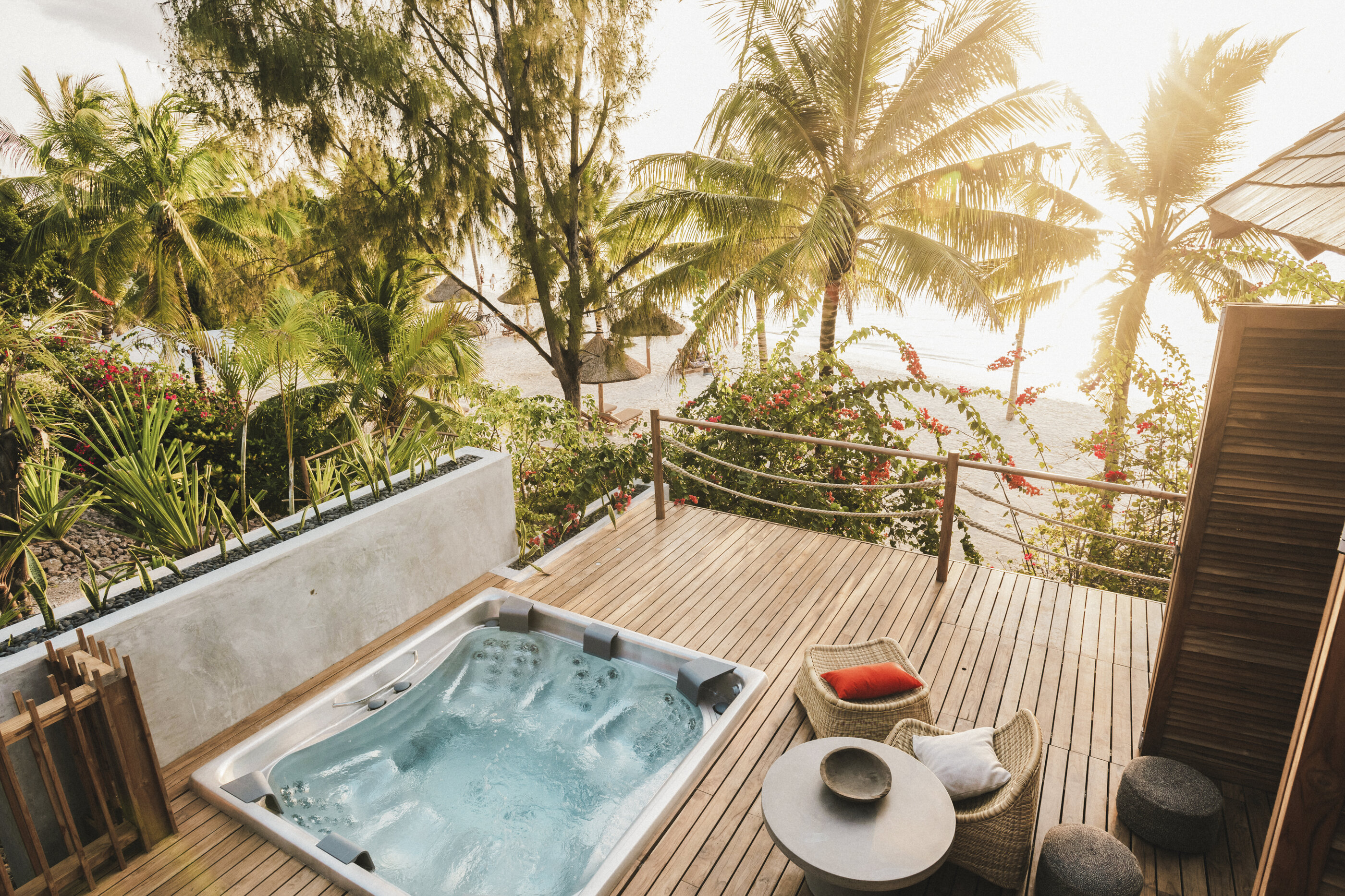 USSPA Master – premium recessed spa with six seats on a Zanzibar terrace overlooking the ocean.