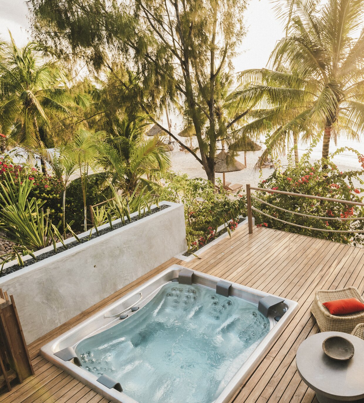 USSPA Master – premium recessed spa with six seats on a Zanzibar terrace overlooking the ocean.