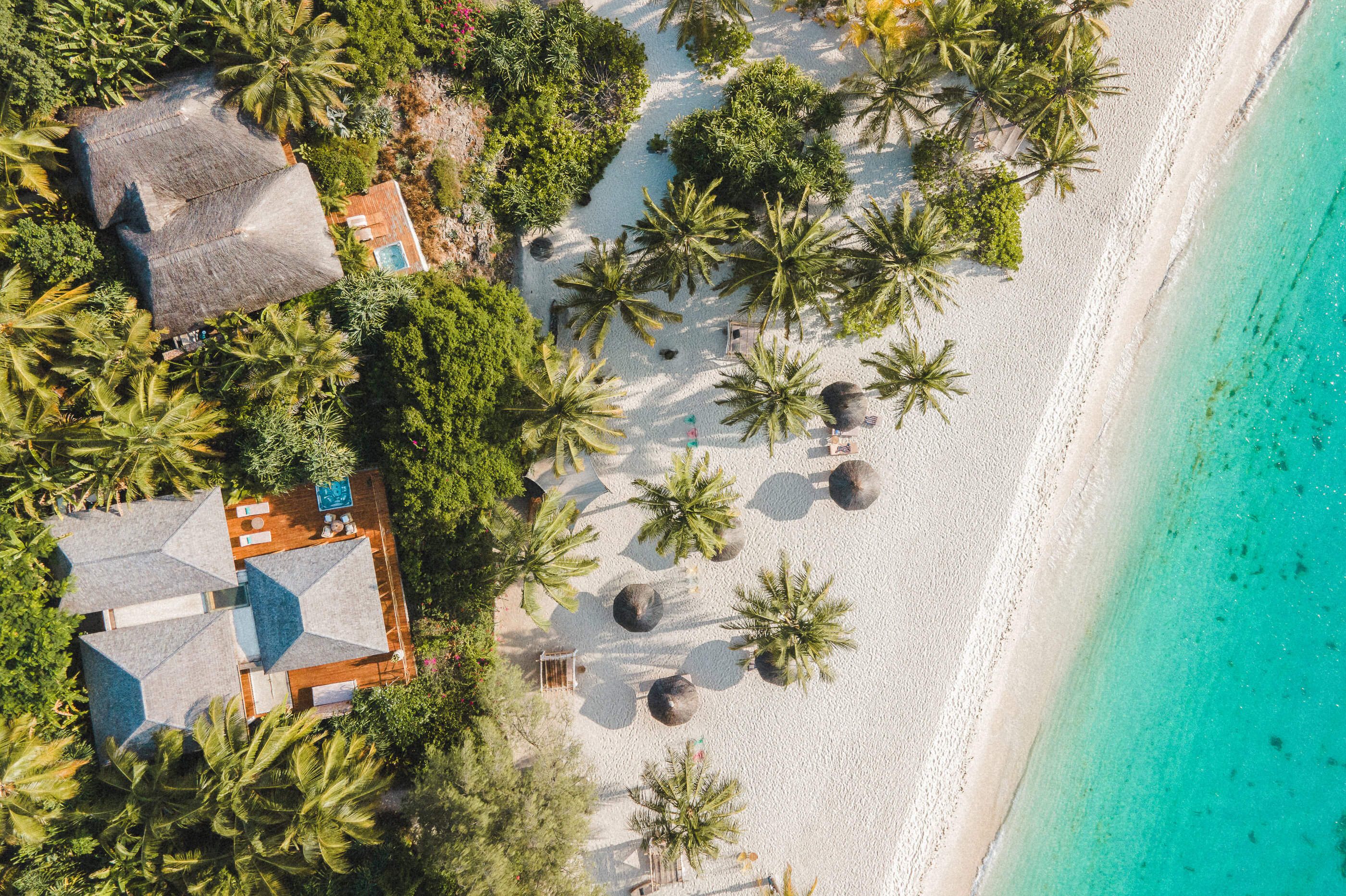 USSPA Master – premium recessed spa with six seats on a Zanzibar terrace overlooking the ocean.
