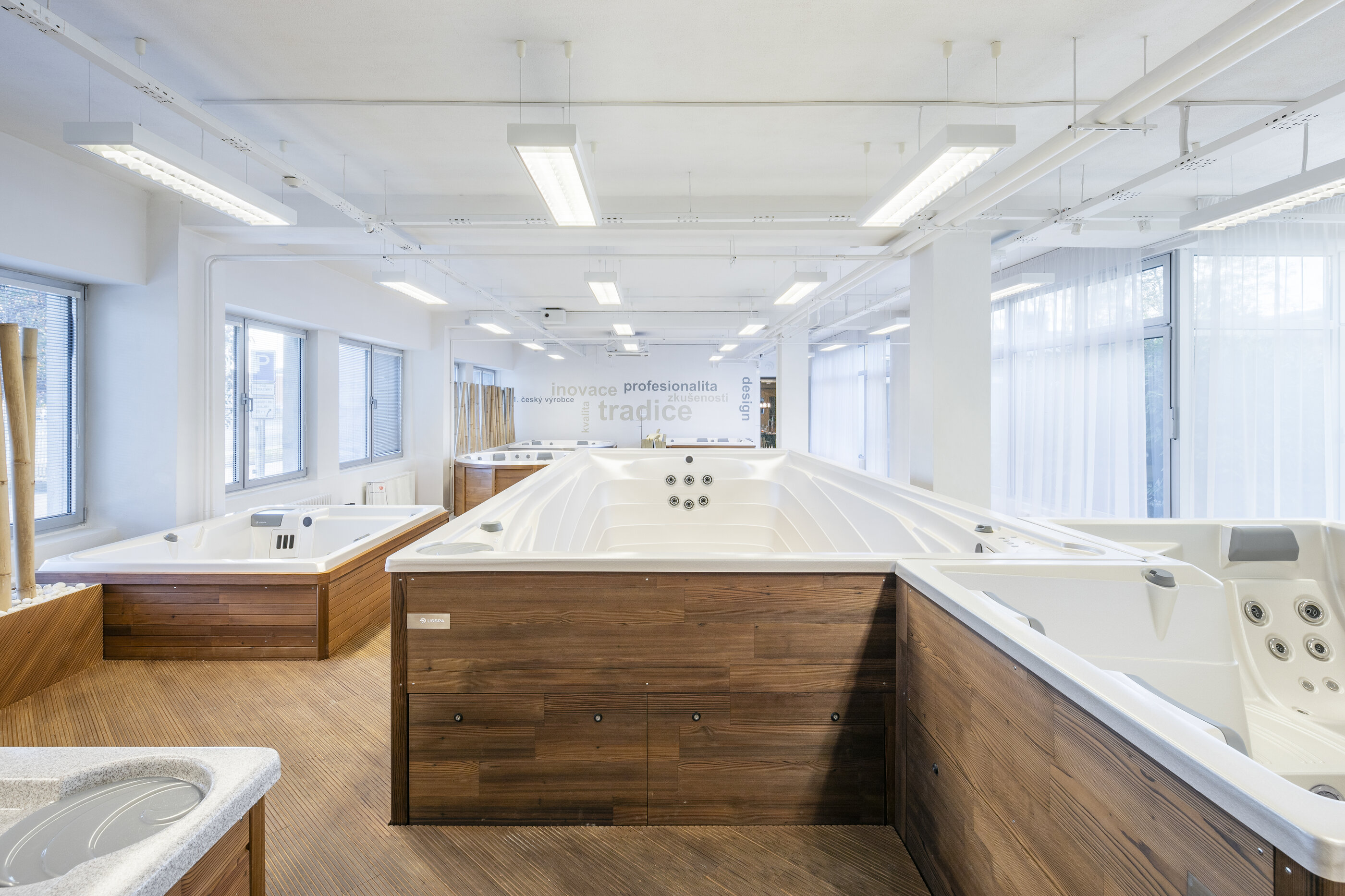 USSPA Brno showroom – design by Atelier Kunc, try spa and swim spa in the bathing zone.