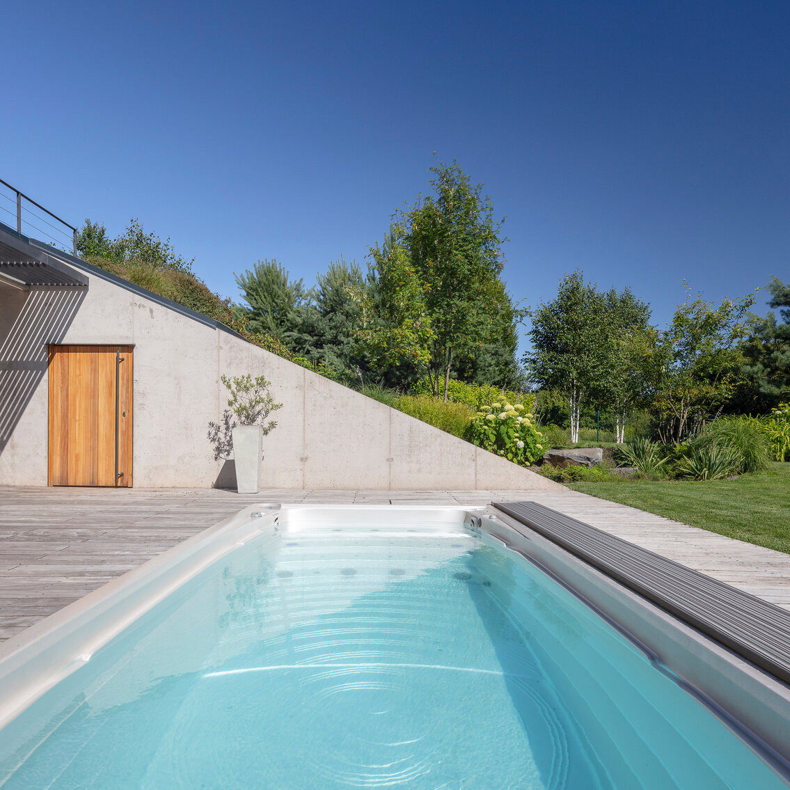 USSPA premium Czech year-round Swim Spa XL pool as a design and functional element of your garden.