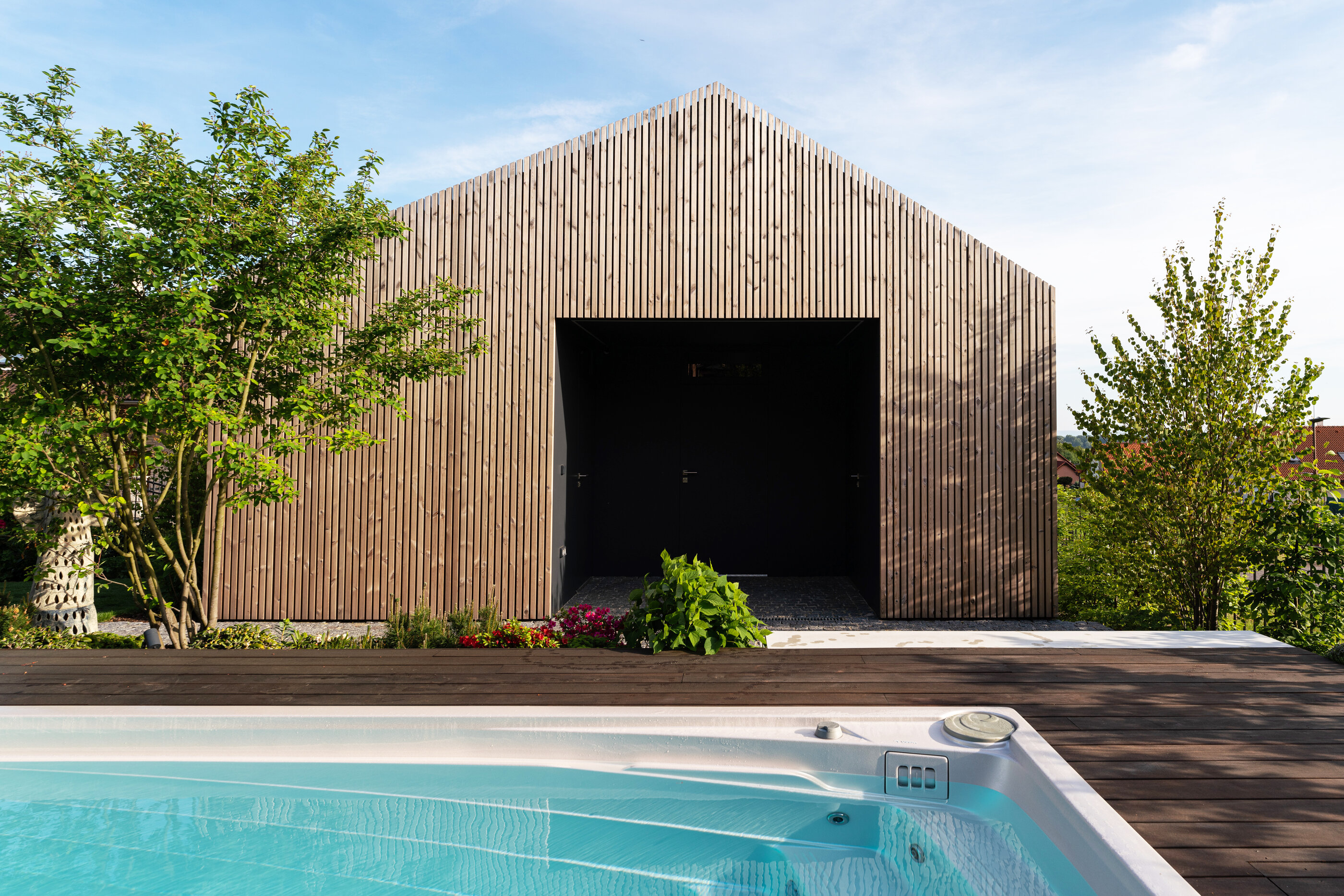 USSPA premium Czech year-round Swim Spa XL pool as a design and functional element of your garden.