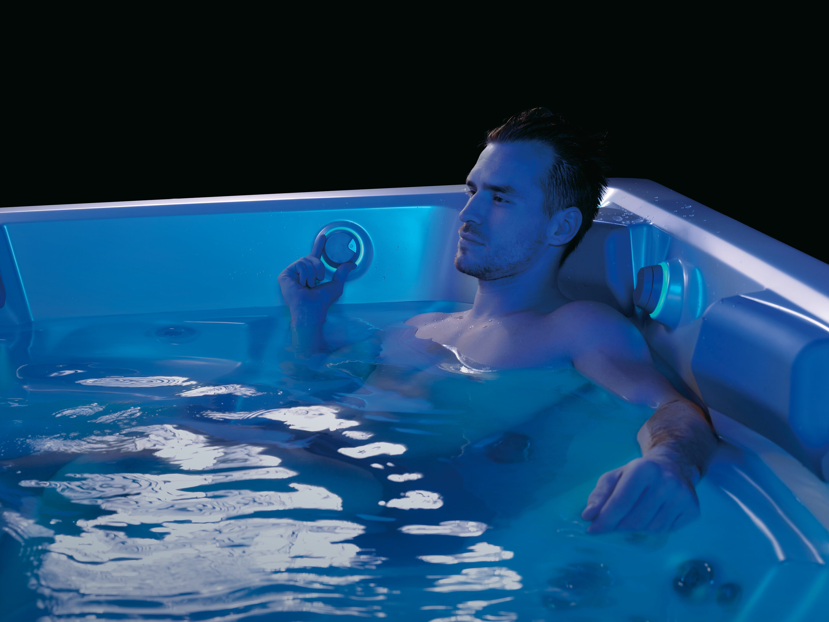USSPA premium Persea iN hot tub made in Czech Republic – man enjoying home wellness.